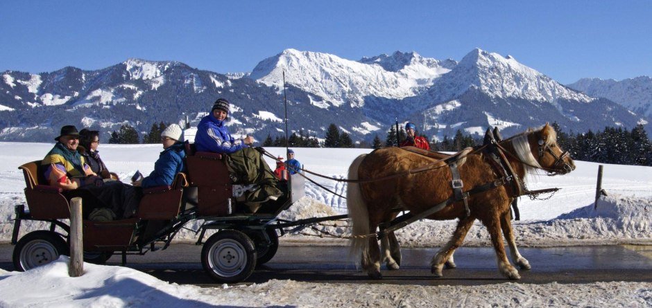 Winterliche Pferdekutschfahrt Obermaiselstein m... © Tourismus Hörnerdörfer