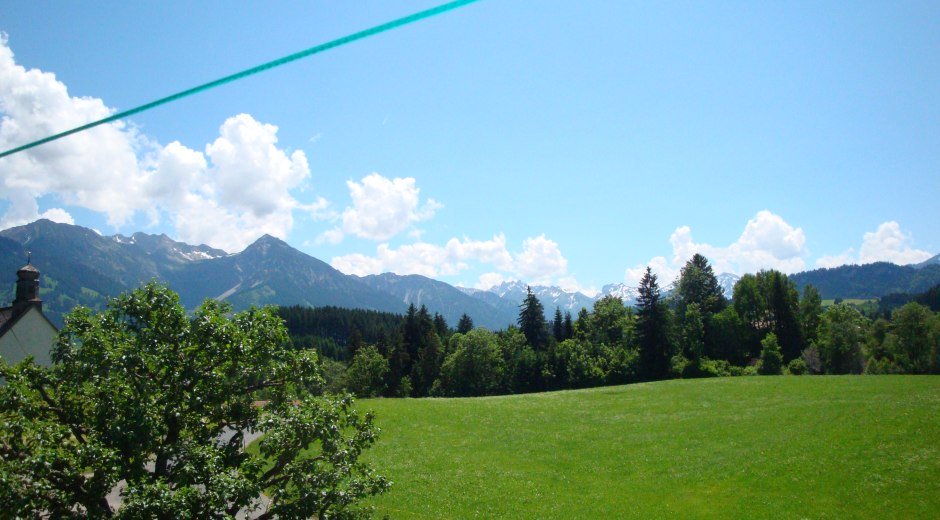 Blick von Untermühlegg auf den Allgäuer Alpen-Hauptkamm © Tourismus Hörnerdörfer