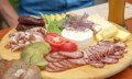 Deftige Brotzeit auf der Alpe Scheuen in Baldersch © Alpe Scheuen